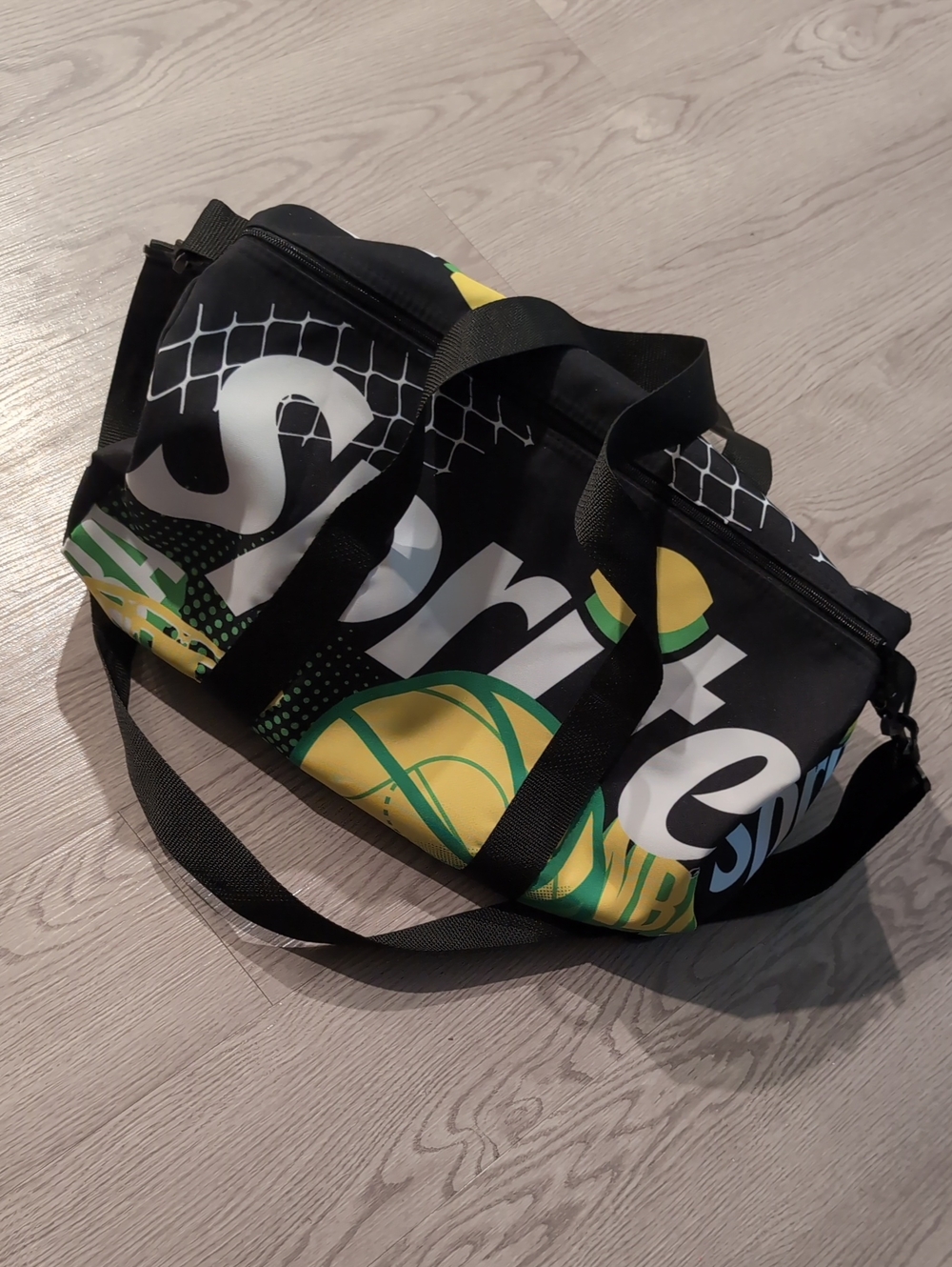 Black Duffel Bag with Yellow & Green Graphic Accents